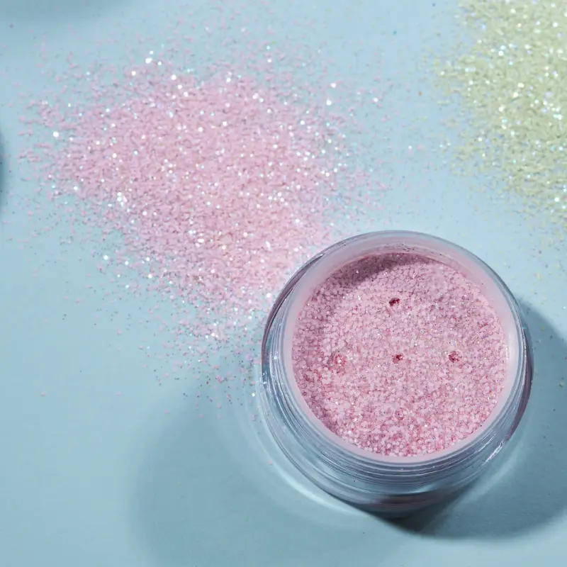 Paillettes fines roses pastel en pot