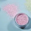 Paillettes fines roses pastel en pot
