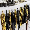 Guirlande pompons or et noir