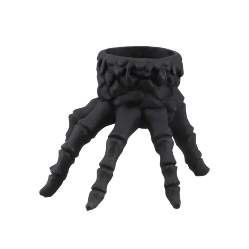 Bougeoir main squelette noir