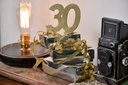 Centre de table 80 ans paillettes or