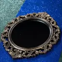 Miroir noir et bronze antique 