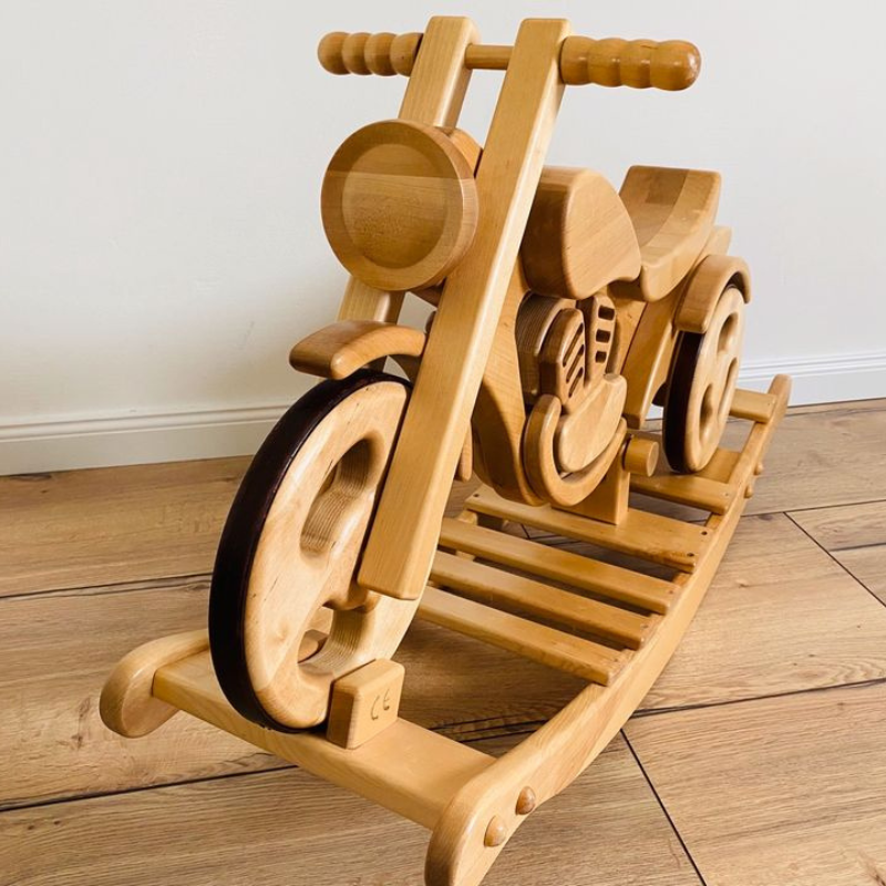 Moto à bascule évolutive en draisienne